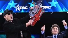 Elon Musk waves 'bureaucracy chainsaw' gifted by Argentina