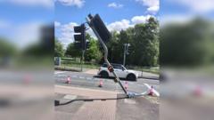 Crossing repairs after vehicle hits traffic lights