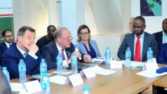 British High Commissioner Paul Arkwright plus Lord Mayor of di City of London, Alderman Charles Bowman for di roundtable