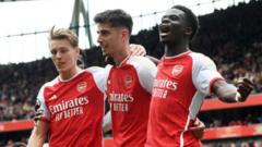 Arsenal cruise past Bournemouth to stay top