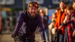 Cyclist completes round-the-world trip before Christmas in promise to mum
