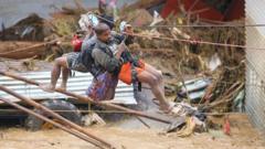 People 'jump from roof to roof' as floods kill 148 in Nepal