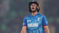 England out of Champions Trophy after Afghanistan thriller