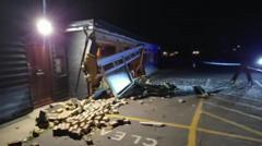 Man charged after car crashes through pub wall