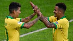Brazil forwards Roberto Firmino (left) and Gabriel Jesus