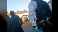'Lock your doors' - Watch police pursue man with sword