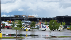 Dozens trapped as tornado collapses FedEx depot