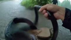 Watch: Texas police rescue baby from car stuck in floodwater