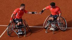 Hewett wins first gold alongside Reid in doubles