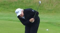 Trump back on the golf course for day two of Scottish visit