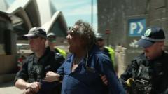 Aboriginal protester arrested during King's Sydney tour