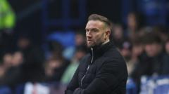 Bolton part company with boss Evatt