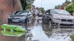 Travel disruption as heavy rain causes flash floods in Ipswich