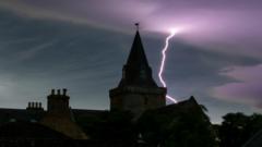 Thunderstorms light up skies across Scotland as weather warnings issued
