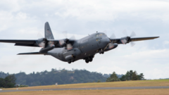 A New Zealand Hercules aircraft carrying emergency supplies flying out of Auckland Airport on Thursday