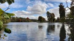 Police search lake for missing teenage swimmer