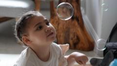 The 'happiest little girl' defying the medical odds