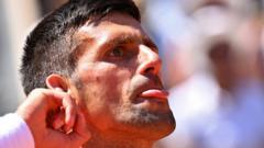 Djokovic beats Nadal record to reach Paris quarters