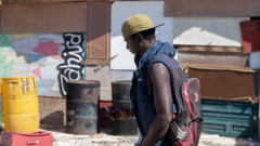 Boja the builder in the ghetto near Campobello di Mazara, Sicily, in Italy