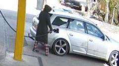 'Woman in pyjamas' wanted after alleged fuel thefts