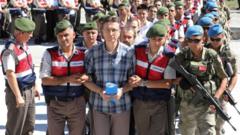 Defendants paraded as mass trial opens, 1 Aug 17
