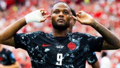 Larin scores to help Canada to first World Cup win