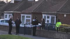 Four held in murder inquiry after death of young woman found in street