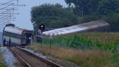 One dead and several injured as Danish train hits tanker and derails