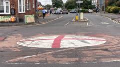 Should Flags Be Allowed on Lampposts but Not Roundabouts?