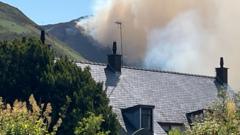 Villagers advised to evacuate due to mountain wildfire