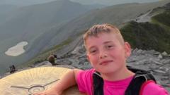 'Superhero' boy, 9, with amputated foot completes Three Peaks Challenge in under 24 hours
