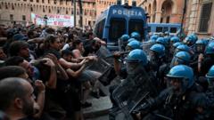 Dozens hurt in Bologna protests after man dies while being restrained by police