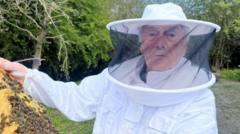'Swarming bees are too full of honey to sting'