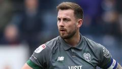 Why Did Captain Ralls and Rinomhota Depart Cardiff City?