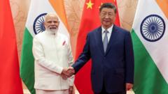 China and India pledge to be 'partners not rivals'