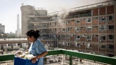 US joining Israeli strikes would cause hell, Iranian minister tells BBC