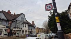 ‘Tiny’ 20mph signs criticised as thousands fined