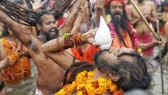 Ash-smeared holy men lead India bathing spectacle