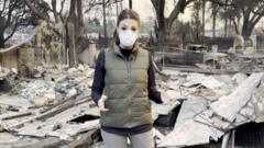 BBC reporter assesses destruction on fire-ravaged street