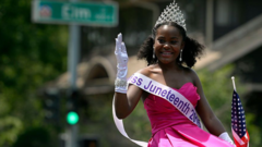 A Miss Juneteenth salutes the public in a holiday parade in Denver