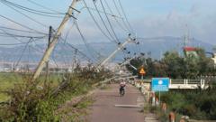 Typhoon which killed almost 200 in Philippines and Vietnam weakens