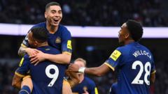 Newcastle players celebrate as dem score against Tottenham