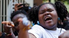 Members of the civil society react as they demonstrate against gender-based violence to mark International Women"s Day in downtown Nairobi, Kenya, March 8, 2022