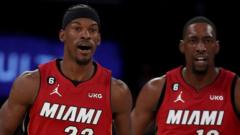 Butler shines as Heat win opener against Celtics