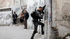 One Israeli border police dey waka enta house for East Jerusalem