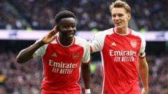 Premier League: Saka doubles Arsenal lead at Spurs