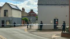 Roads closed after man refuses to leave address