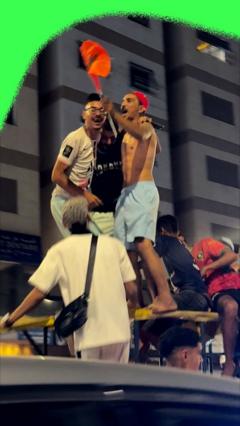 Morocco fans celebrate after their team beat Canada 3-0 to reach the World Cup quarter-finals