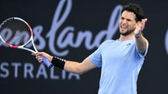 Snake stops play during Thiem victory in Brisbane