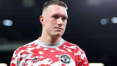 Ex-Man Utd defender Jones retires and eyes coaching